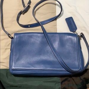 Blue coach crossbody purse.